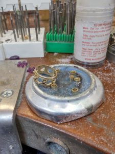 restoring a ring with new bezel set garnets
